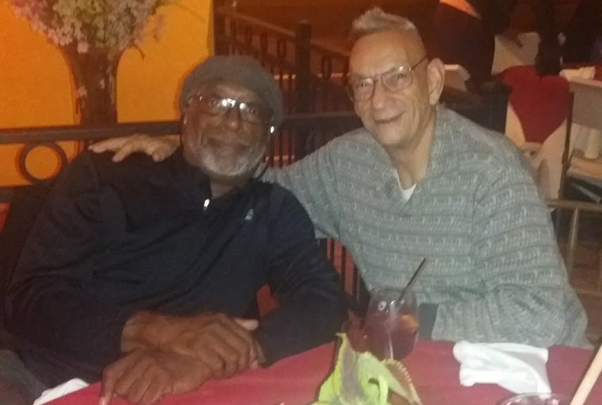Two attendees of NJ Buddies and CAPCO's 2018 National Latinx AIDS Awareness Day event, smiling.